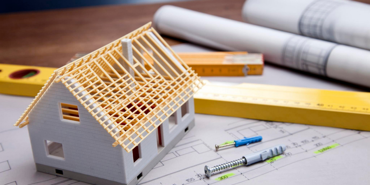 House model and drawings on the table